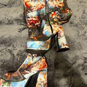 “Davinci’s Demons” Platform thigh high boots.